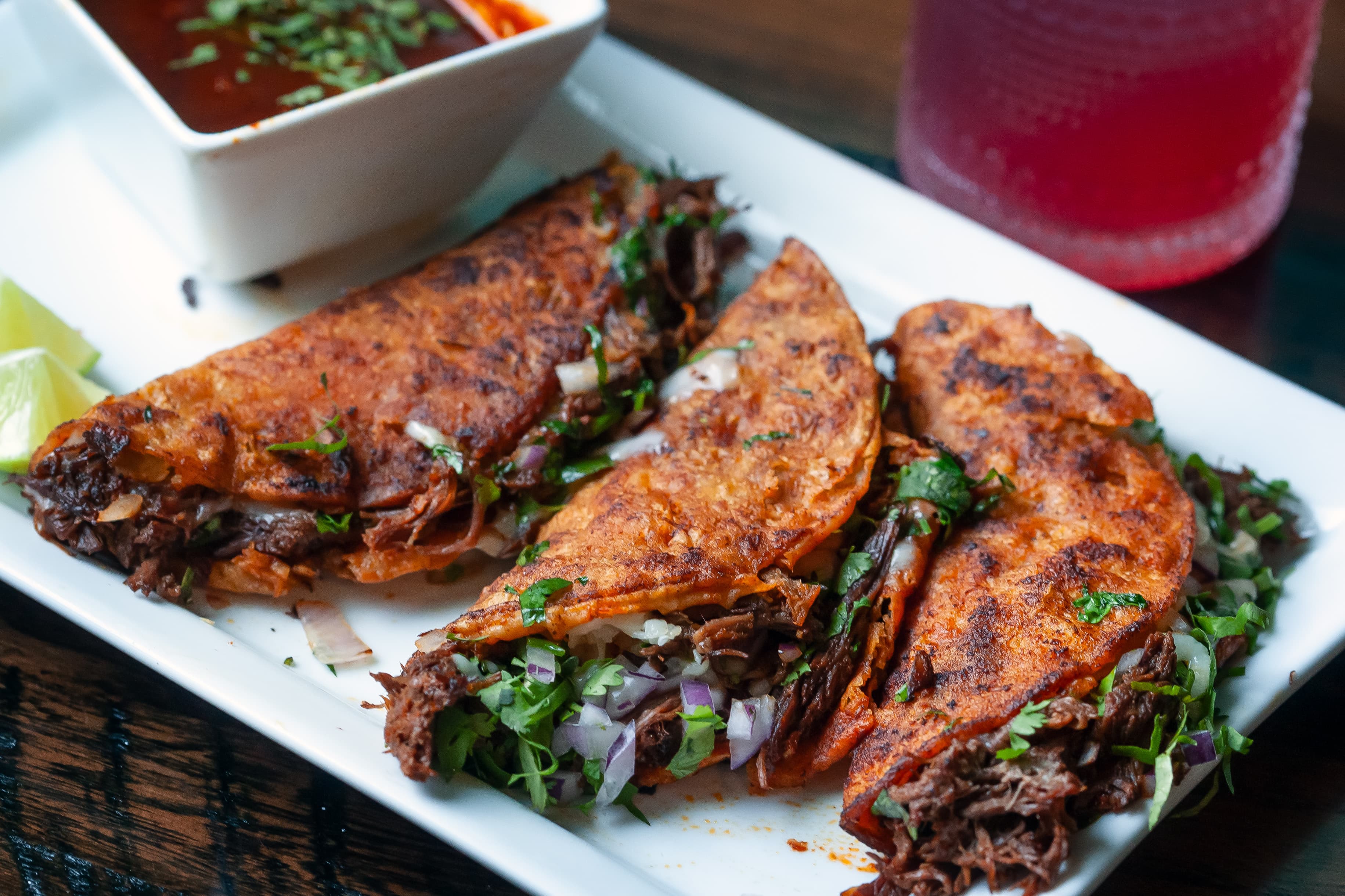 Quesabirria tacos with consomme